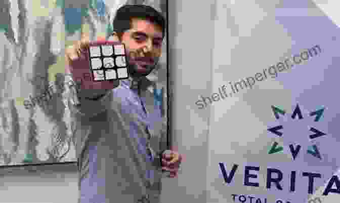 A Gamer Solving A Complex Puzzle, Holding A Rubik's Cube And A Controller Guinness World Records 2024 Gamer S Edition