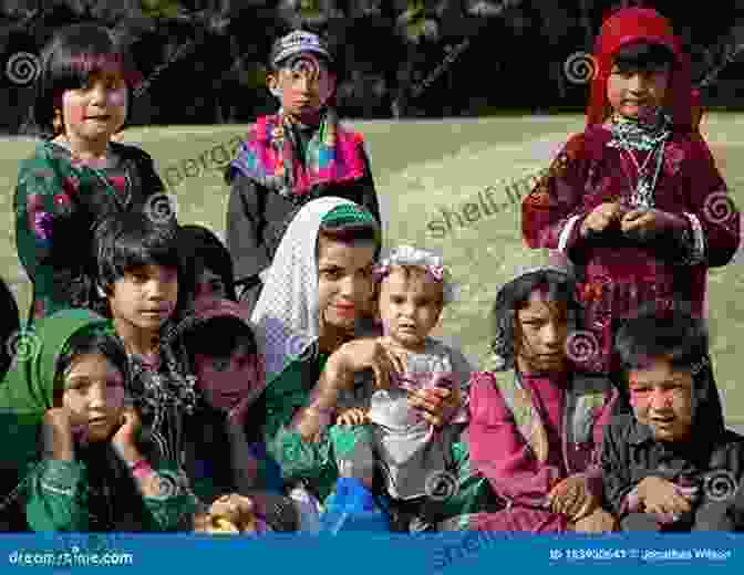 A Group Of Afghan Children Smile And Wave At The Camera In A Rural Village. Snaps Of Afghanistan Herman L Bennett