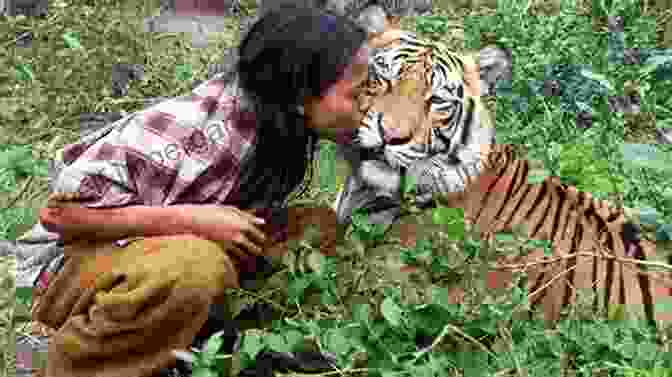 A Photo Of A Human And A Wild Animal Interacting Peacefully World On Fire: Humans Animals And The Future Of The Planet