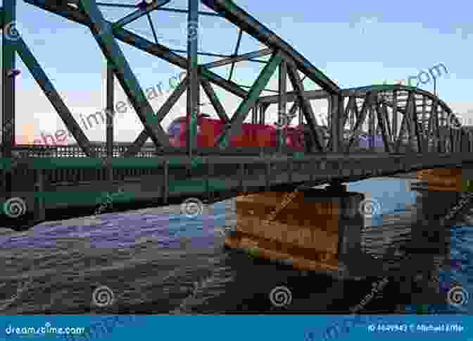 A Vintage Train Crossing A Bridge Over A River, With Lush Greenery And A Clear Blue Sky In The Background. Railroads Of Southwest Florida (Images Of America)