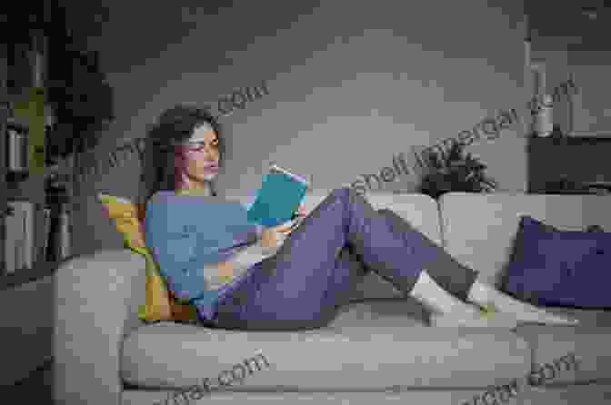 A Woman Reading A Book While Sitting On A Couch Outsmart Your High Stress Divorce: 39 Practical Tips For Reducing Conflict And Empowering Yourself Today