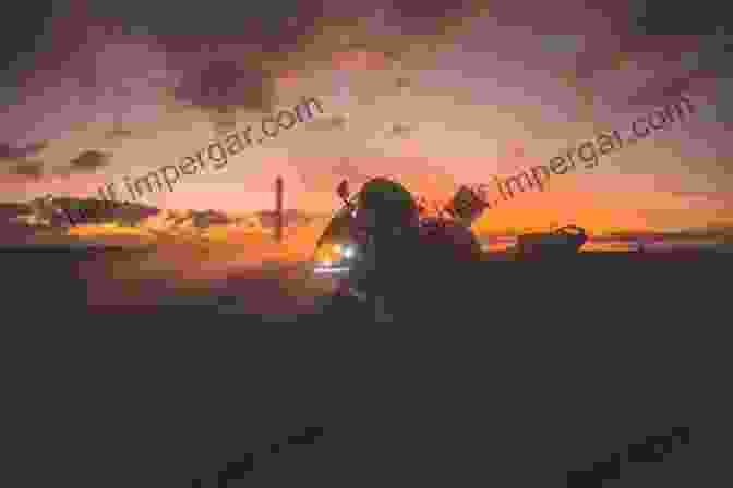 Motorcyclist Riding Into The Sunset After The Pandemic. Riding In The Time Of The Plague : Motorcycle Travels During Covid 19