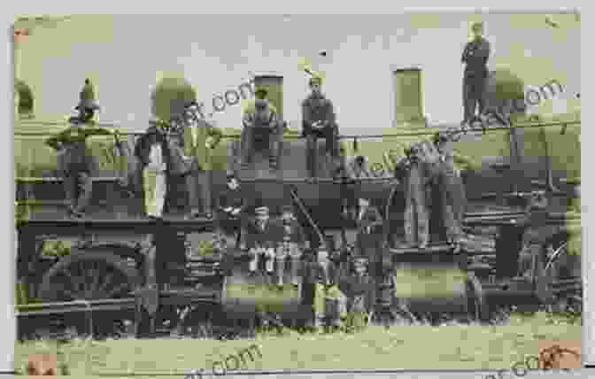 Railroad Workers Proudly Posing In Front Of A Steam Locomotive, Their Faces Etched With Pride And Camaraderie. Iowa S Railroads: An Album (Railroads Past And Present)